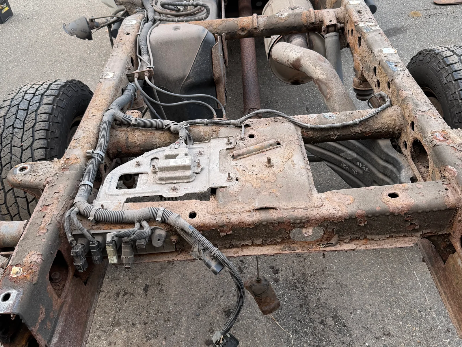 Chevrolet frame before undercoating.