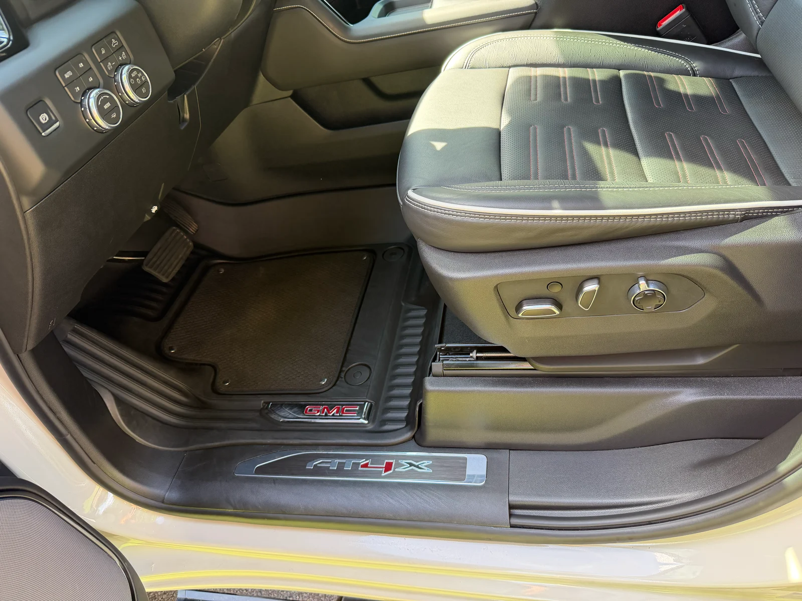 GMC driver footwell and seat after interior detailing.