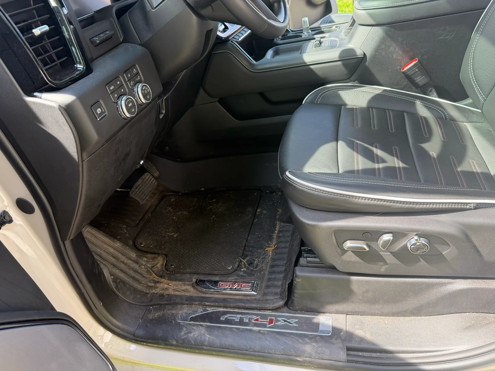 GMC driver footwell and seat before interior detailing.